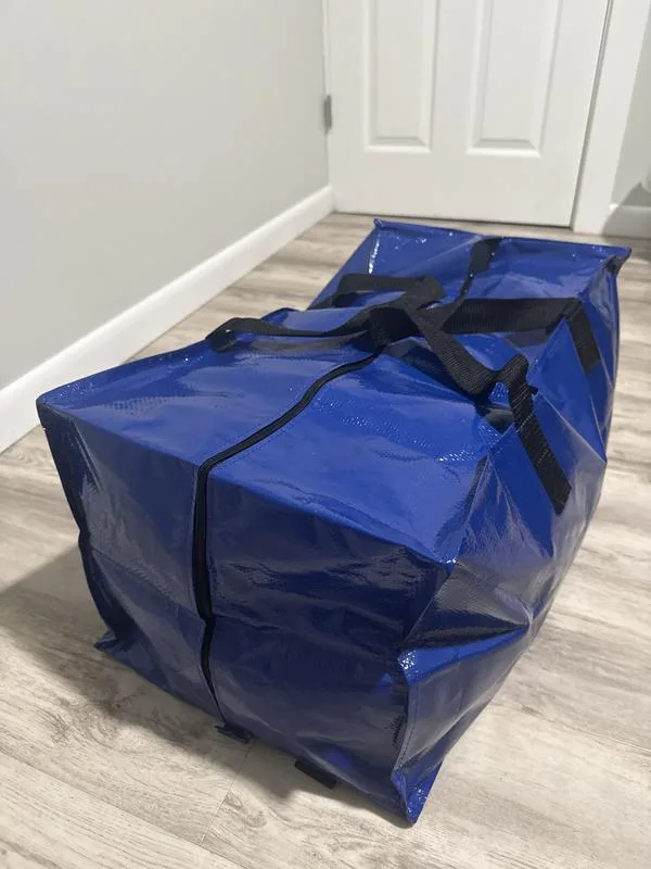 Heavy-duty reusable moving bag with handles